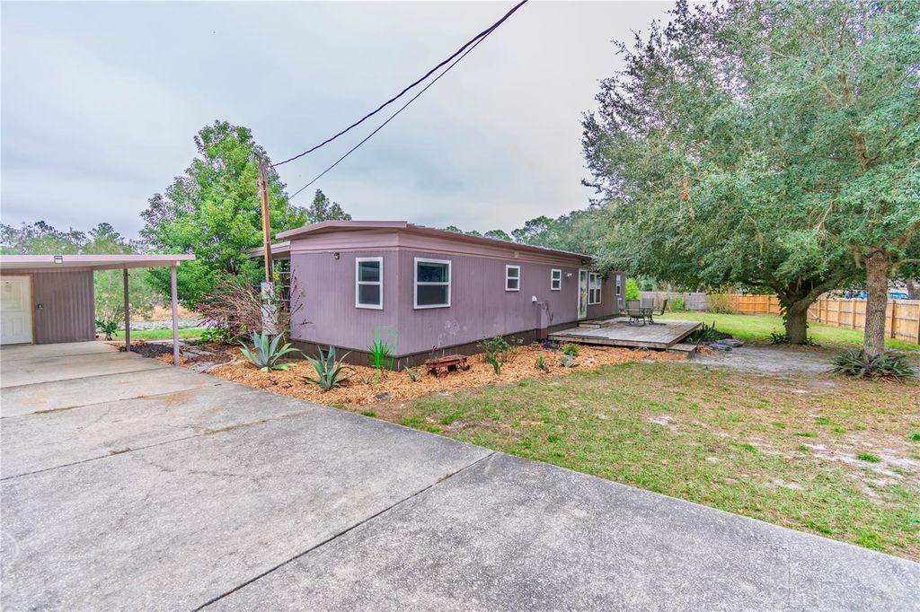 Photo of 3831 E Camelot Place, Hernando, FL 34442 (MLS # OM714783)