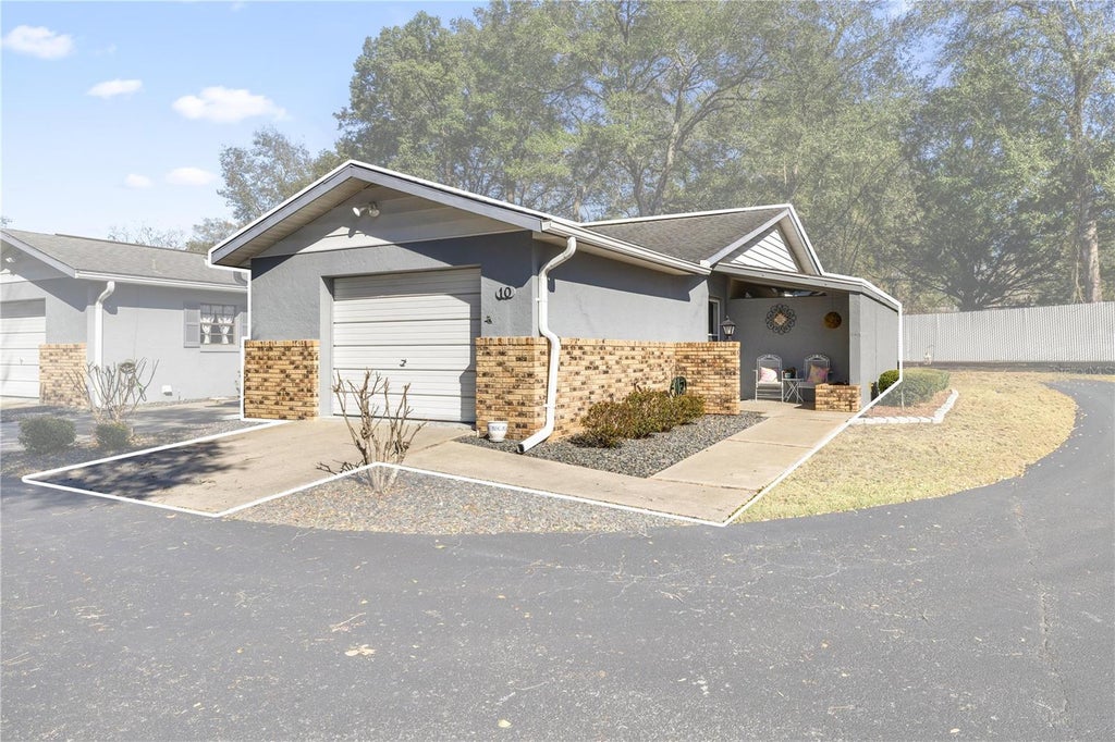 Photo of 3800 E Silver Springs Boulevard #10, Ocala, FL 34470 (MLS # OM734063)