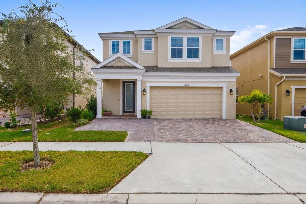 Photo of 17880 Moon Rise Pass, Land O Lakes, FL 34638 (MLS # TB8460686)