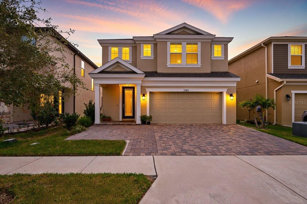 Photo of 17880 Moon Rise Pass, Land O Lakes, FL 34638 (MLS # TB8460686)