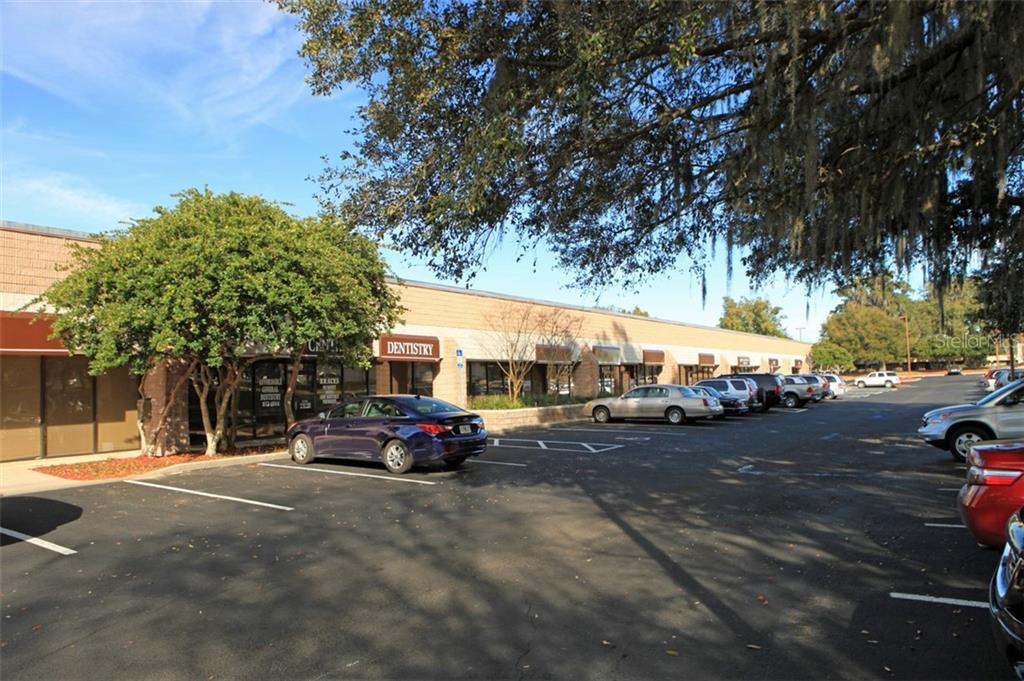 FOR LEASE: Office spaces of various sizes and centrally located near Paddock Mall, SR200 and I-75, this large office facility is a great value and convenient for both clients and employees. Several units available both office and medical. Paddock Park Business Center is ideally located -- in close proximity to the best retail, restaurant, and lodging amenities in Ocala. It is also surrounded by a prime-demographic customer base and is in an area extremely popular with medically-oriented businesses. It also has the advantage of being in Ocala's finest planned business park. The owners take great pride in Paddock Park Business Center and are confident that it will provide what you need.
Unit 103: 7,125sf office, a former call center, with lobby, large break area, extra large training area/conf room, perimeter offices, and tenant may use or landlord will dispose of the call center stations in the large open center area. Base Rent $9/sf/yr plus NNN $5.88/sf, Total: $8,835.00/month plus sales tax.
Unit 103:
