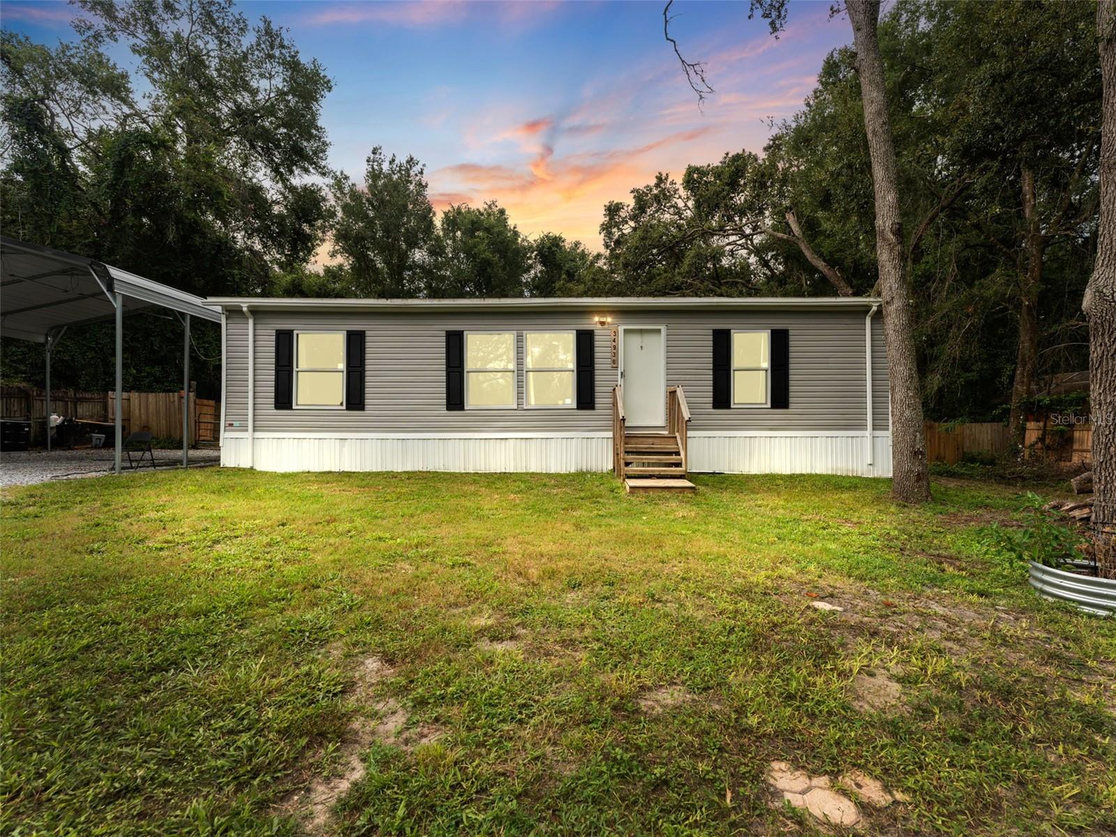 Welcome to your charming dream home at 34930 Emily Dr, Dade City, FL! This beautiful 2023 built home on .49 acres offers a perfect blend of comfort, style, and convenience. Nestled in a peaceful neighborhood, this home provides an ideal retreat from the hustle and bustle of city life while still being close to all essential amenities. This home has been meticulously maintained and is move-in ready. With its blend of modern amenities and cozy charm, it’s the perfect place to create lasting memories. Don’t miss the opportunity to make this your new home. Schedule a viewing today and experience all that this wonderful property has to offer