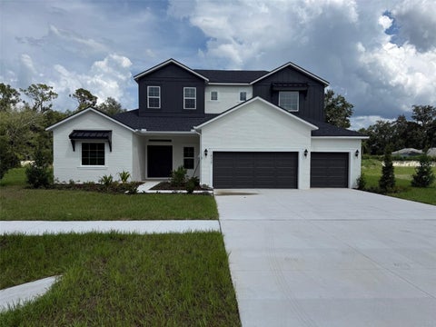 Photo of 18437 Purple Creek Lane, Lutz, FL 33549 (MLS # J1005421)
