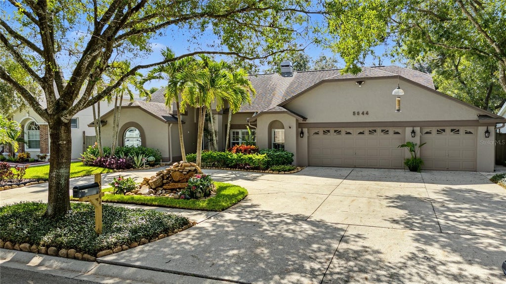 Photo of 5644 Glencrest Boulevard, Tampa, FL 33625 (MLS # TB8560286)