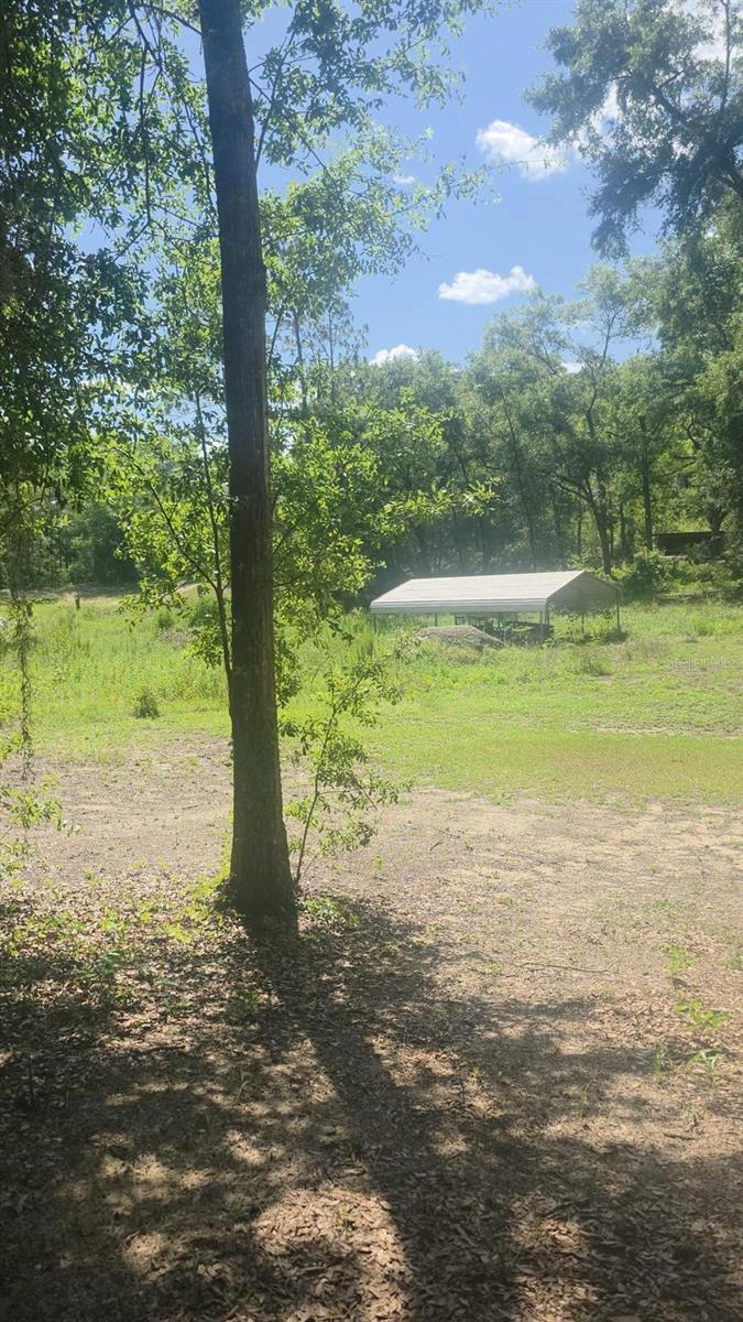 Welcome to this spacious 1.14-acre vacant residential lot nestled in the desirable Rolling Hills Unit 5 subdivision of Ocala, Florida. Located in a peaceful, up-and-coming area, this property offers a perfect opportunity to build your dream single-family home in a tranquil setting with room to grow.
Why You’ll Love It:
• Peaceful countryside setting with no HOA
• Room for custom home, pool, workshop, or garden
• Easy access to SR-40, minutes to Ocala shopping, dining, and the World Equestrian Center
• Zoned for residential use with no current structures or improvements
• Includes Carport