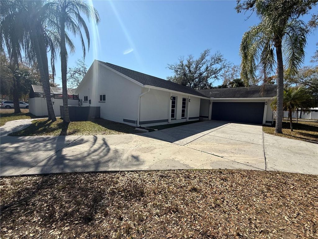 Photo of 6728 Islander Lane, Tampa, FL 33615 (MLS # TB8471138)