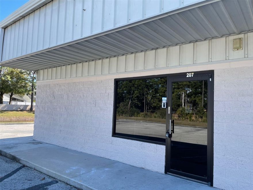 Very nice unit offering approximately 2000 sqft space for office, storage, warehouse or other commercial usage. The entire space is air
conditioned and would make a great professional space. Highway signage on busy 441 with high traffic count and located conveniently between the Turnpike and CR 417. There is a large overhead roll-up door around the back and office access through the front. This space has so much potential and must be seen! This is for unit 207 which is in the back building and set up as an office/warehouse space. There is approximately 900 sq ft  office space and approximately 1100 sq ft warehouse. No automotive repair/body shops and no churches as there is already one in the complex and parking will not accommodate.