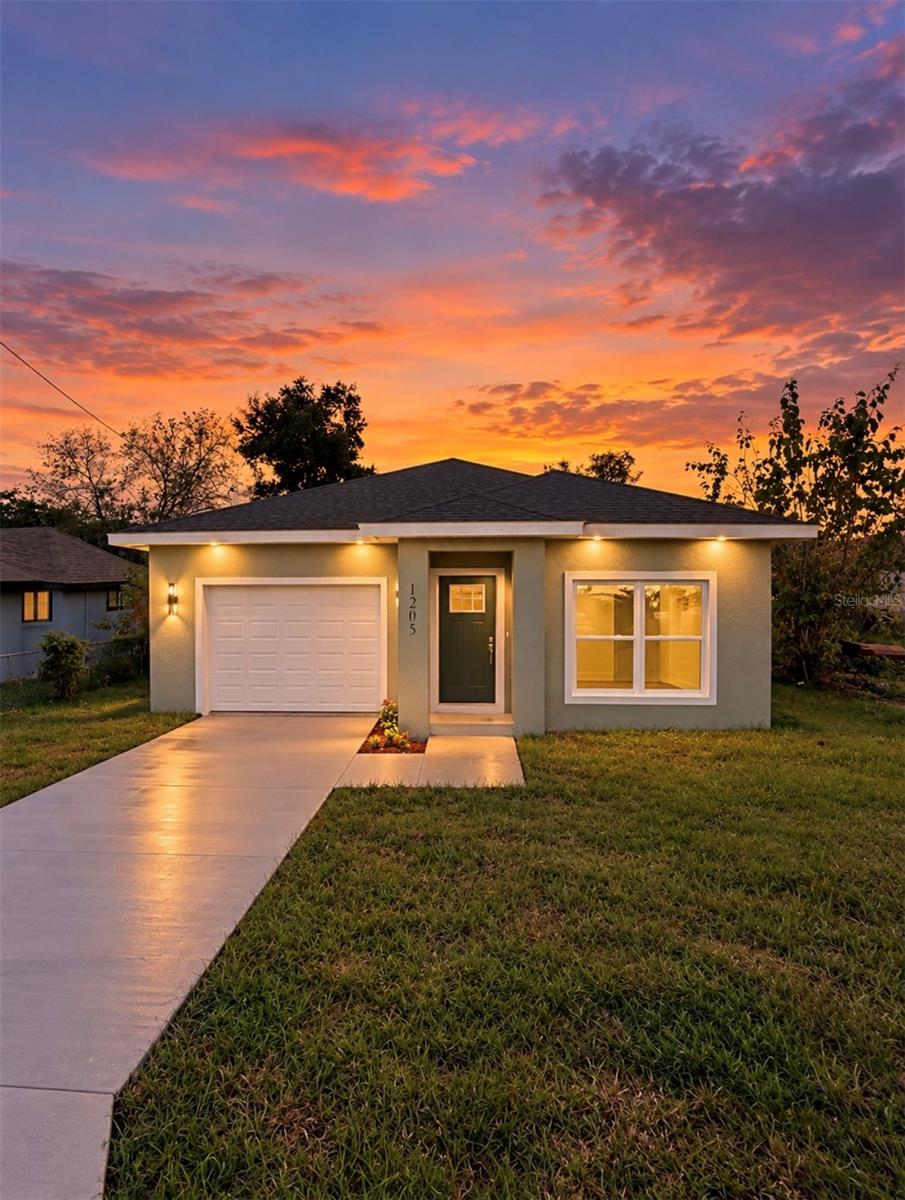 Photo of 1205 Avenue K, Haines City, FL 33844 (MLS # O6447188)