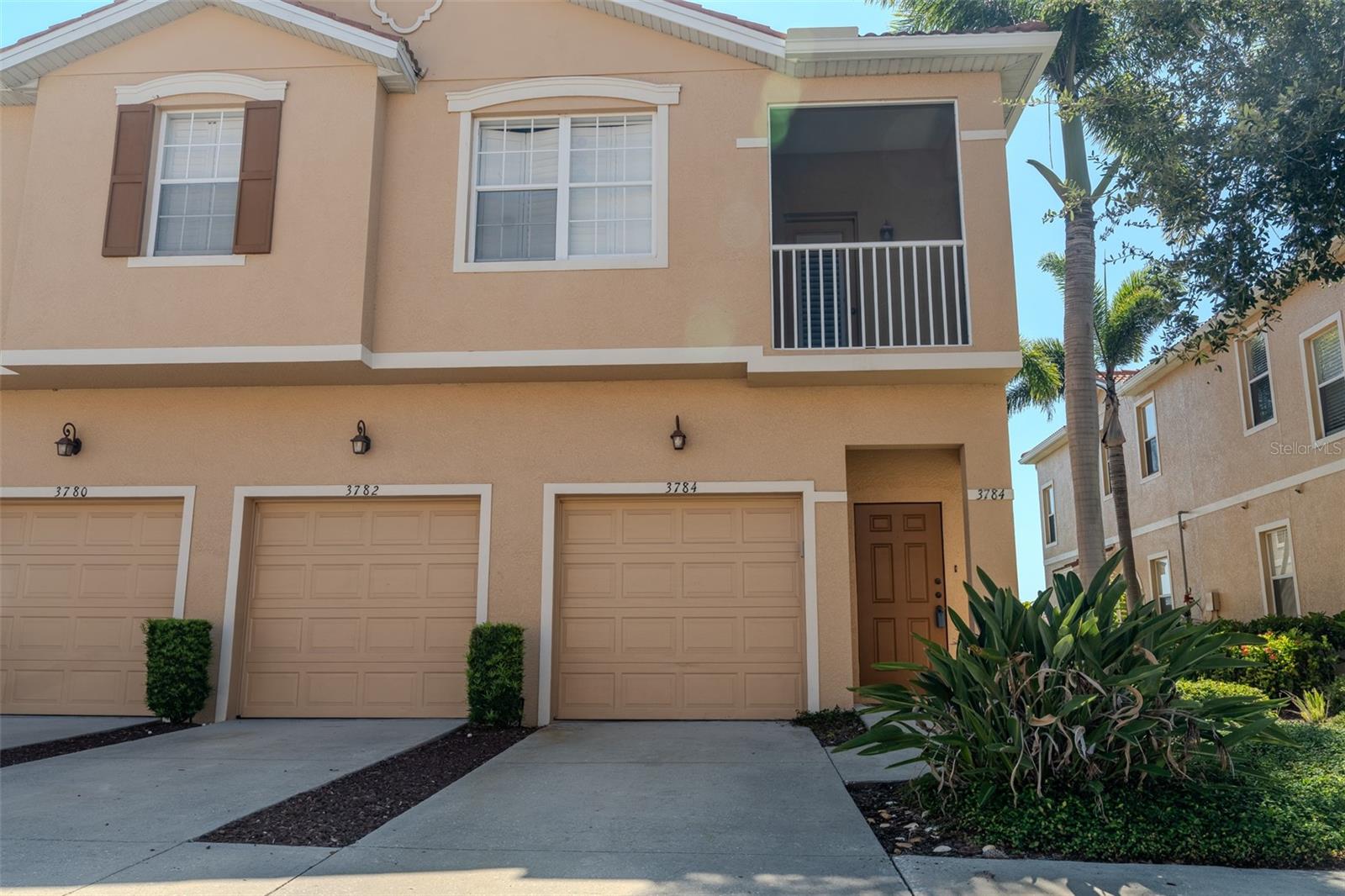Location, location, location! Welcome to your ideal retreat! This beautiful, newly renovated 2-bedroom, 2-bathroom townhome offers the perfect combination of comfort, convenience, and location. Located in a friendly, well-maintained community, just minutes from the best restaurants, shopping (UTC 4 miles away), and pristine beaches (Siesta Key 12 miles away). Interior features include freshly painted walls and luxury vinyl plank (LVP) flooring throughout. The open-concept living area is filled with natural light thanks to its large windows with plantation shutters, creating a bright and inviting space. The spacious master suite offers a private bathroom and a large walk-in closet. The second bedroom is perfect for guests, a home office, or a study. Recent improvements include a new roof (2024), new air conditioning, a freshly painted garage floor, and storm surge protection installed by FPL. Community amenities include a resort-style pool and a welcoming atmosphere. With modern updates and a prime coastal location, this townhome is move-in ready and a must-see!