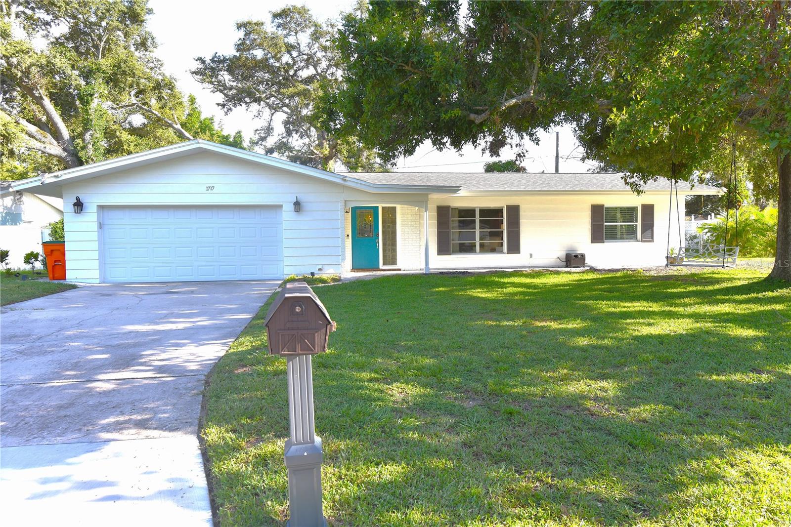 Come and look at this amazing four bedrooms, two bathrooms 1854 heated square feet home located in the well-established Bel-Keene Subdivision, steps to Keene and Belleair Road, served by plenty of Grocery shops, with easy access to main thoroughfares as US-19, East Bay/West Bay Dr. that will allow a very easy commute to Saint Petersburg, Tampa, Clearwater Beach, etc.
This house will impress you from the moment you will walk in! You will be welcomed by a large living room that does merge into the kitchen on your left.
The kitchen has been refurbished and enlarged by the current owner and boasts recently epoxied countertops and repainted cabinets, with truly high-end newer appliances and quite a lot of prep space for your cooking or entertaining.
The back of the kitchen connects to the over-sized garage with washer and dryer, extra space on its side, overhead storage space and plenty of room for your toys.
The primary bedroom is located on the South-East side of the house, while the other three guest bedrooms and the guest bath are on the West side of it, giving you a convenient split floorplan, with its privacy perks.
The main Roof and flat roof are 2017 & 2016 respectively, while the HVAC system is from 2013. The septic tank has been recently inspected and in good shape, while the Florida room boasts newer pavers and overlooks the private backyard for your daily morning coffee.
There is an extra, large room currently used as media room, connected to the living room and the covered porch with a wood burning fireplace.
A new laminate, floating floor has been laid down by the owners, with a five inches baseboard throughout, that give the house a modern look. The house has been repainted inside with a neutral grey and a pleasant off-white outside. This house has great curb appeal; it's a charming house built in the midcentury with plenty of upgrades. The spacious sides and backyard complete the picture! Please note that the last sales in the same neighborhood came in at $777000, $645000 and there is a pending sale at $739000, that although larger, does give you an idea of the neighborhood value!