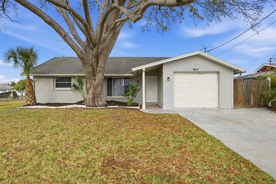 One or more photo(s) has been virtually staged. Welcome to this beautifully updated 3-bedroom, 2-bath canal-front home with direct Gulf access! Nestled in a quiet coastal neighborhood, this move-in ready home features a light and bright interior with modern tile flooring throughout, a spacious open-concept living area, and two large living rooms—perfect for entertaining or relaxing. The kitchen boasts white shaker cabinets, quartz countertops, and stainless steel appliances. Enjoy peaceful water views from the dining room and living space. The primary suite offers privacy and ample space, while two additional bedrooms provide flexibility for guests or a home office. Step outside to your private dock, ideal for boating, fishing, or soaking up the Florida sun. With no rear neighbors, a fenced yard, and a one-car garage, this home has everything you need for full-time living or a vacation getaway. Located minutes from Hudson Beach, restaurants, shopping, and US-19. Don’t miss this affordable waterfront gem—schedule your showing today!