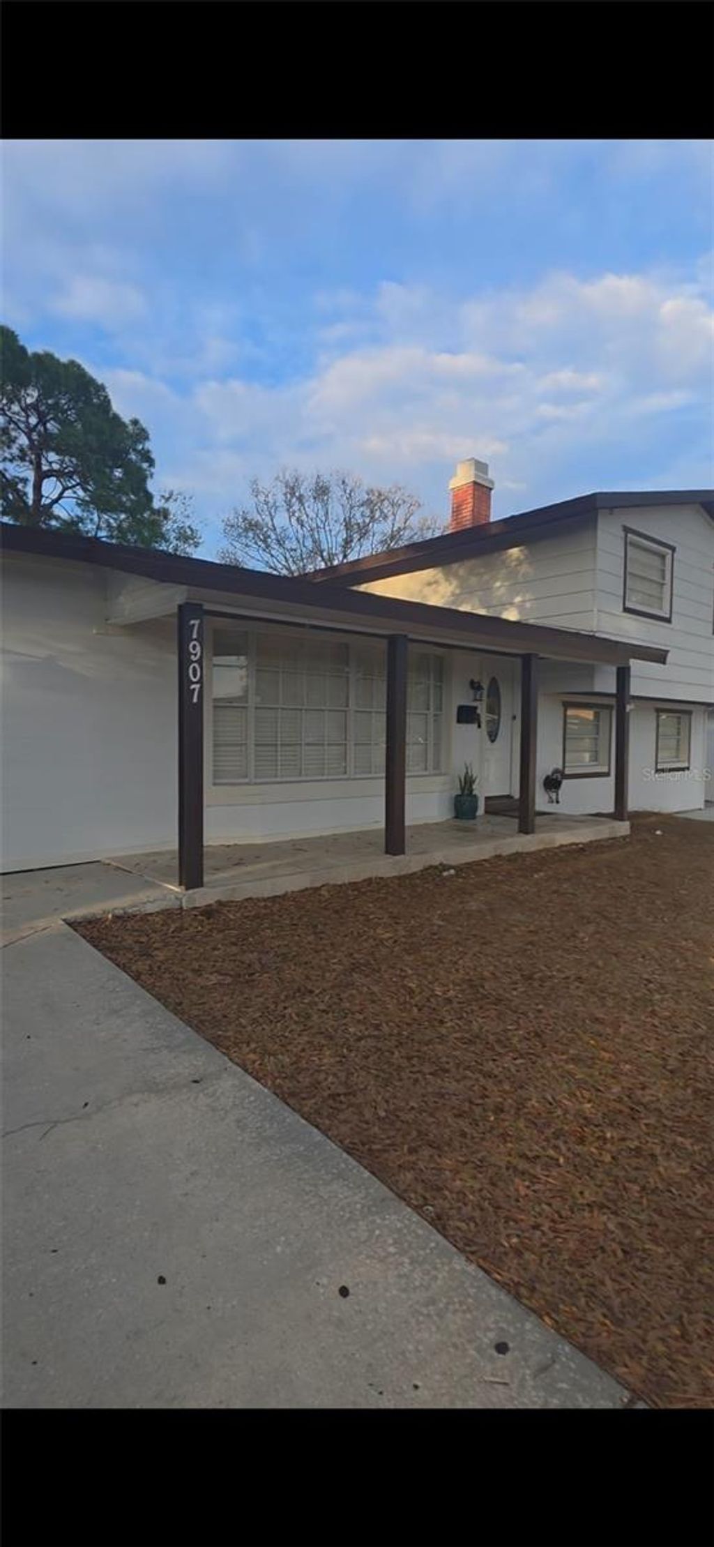 Photo of 7907 W Hiawatha Street, Tampa, FL 33615 (MLS # TB8483616)