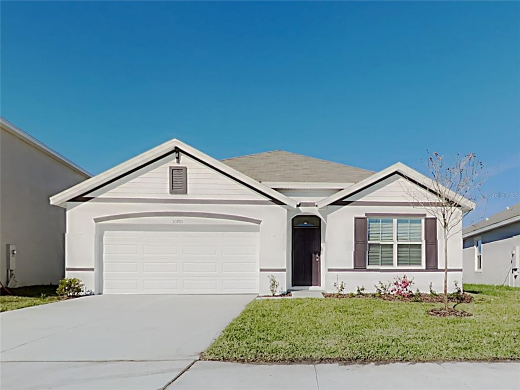 Photo of 30985 Penny Surf Loop, Wesley Chapel, FL 33545 (MLS # O6362137)