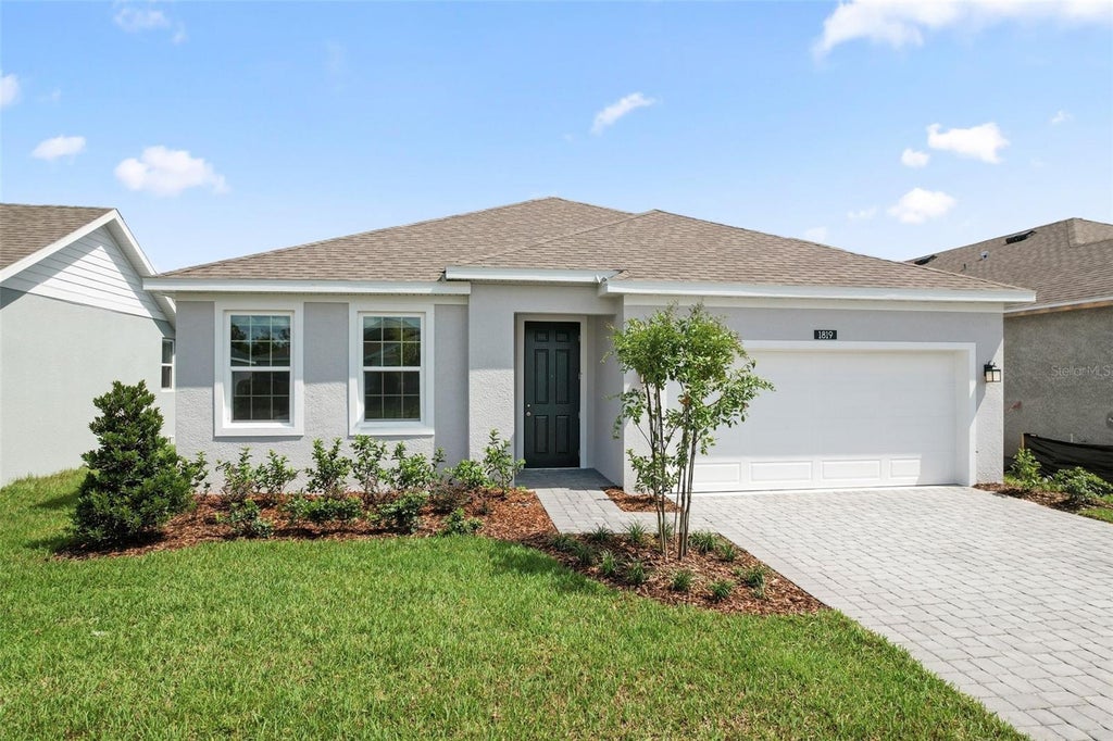 Photo of 1819 Lattice Way, Saint Cloud, FL 34771 (MLS # O6413218)