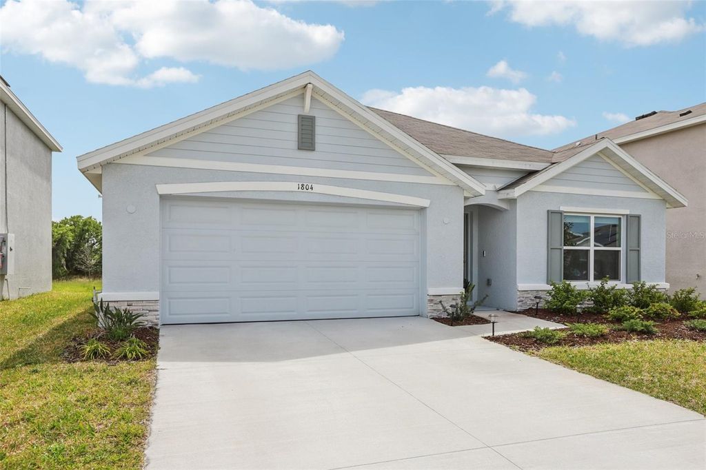 Photo of 1804 Tahitian Sunrise Drive, Plant City, FL 33565 (MLS # TB8492958)