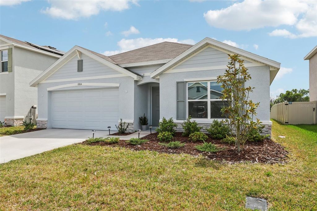 Photo of 1804 Tahitian Sunrise Drive, Plant City, FL 33565 (MLS # TB8492958)