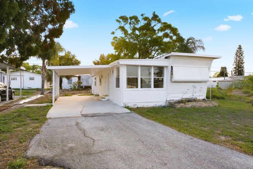 Photo of 2110 Orange Drive, Holiday, FL 34691 (MLS # TB8488043)