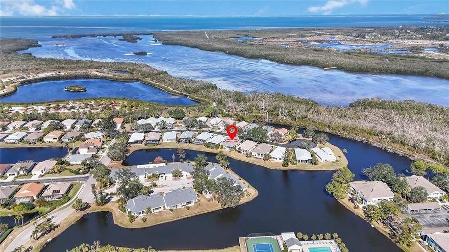 Welcome home to your newly renovated retreat in The Sanctuary at Perico Isles. For added peace of mind, this home sustained no damage during last year's storms and is not located in a flood zone. 
This stunning 4-bedroom, 3-bathroom home has been professionally designed and renovated to offer a perfect balance of style and comfort. Featuring an open and spacious layout, the primary suite and two additional bedrooms are conveniently located on the main floor, while the second level offers a private retreat with a bedroom, full bathroom, office nook, and loft—ideal for remote work, guests, or additional living space.
Step outside to your expansive screened lanai and paver patio, where serene pond views create a peaceful and private oasis. Whether you're dining al fresco, lounging with a book, or entertaining under the Florida sun, this outdoor space is designed for relaxation and enjoyment.
This home is just a short walk or bike ride to the pristine beaches of Anna Maria Island and moments from Robinson Preserve, where you can explore scenic walking trails, kayak through mangroves, and immerse yourself in nature. As a resident, you’ll also enjoy exclusive access to resort-style amenities, including a fitness center, swimming pool, and tennis courts.
Don’t miss this rare opportunity to own a move in ready furnished home in one of the most desirable coastal communities on Florida’s Gulf Coast!