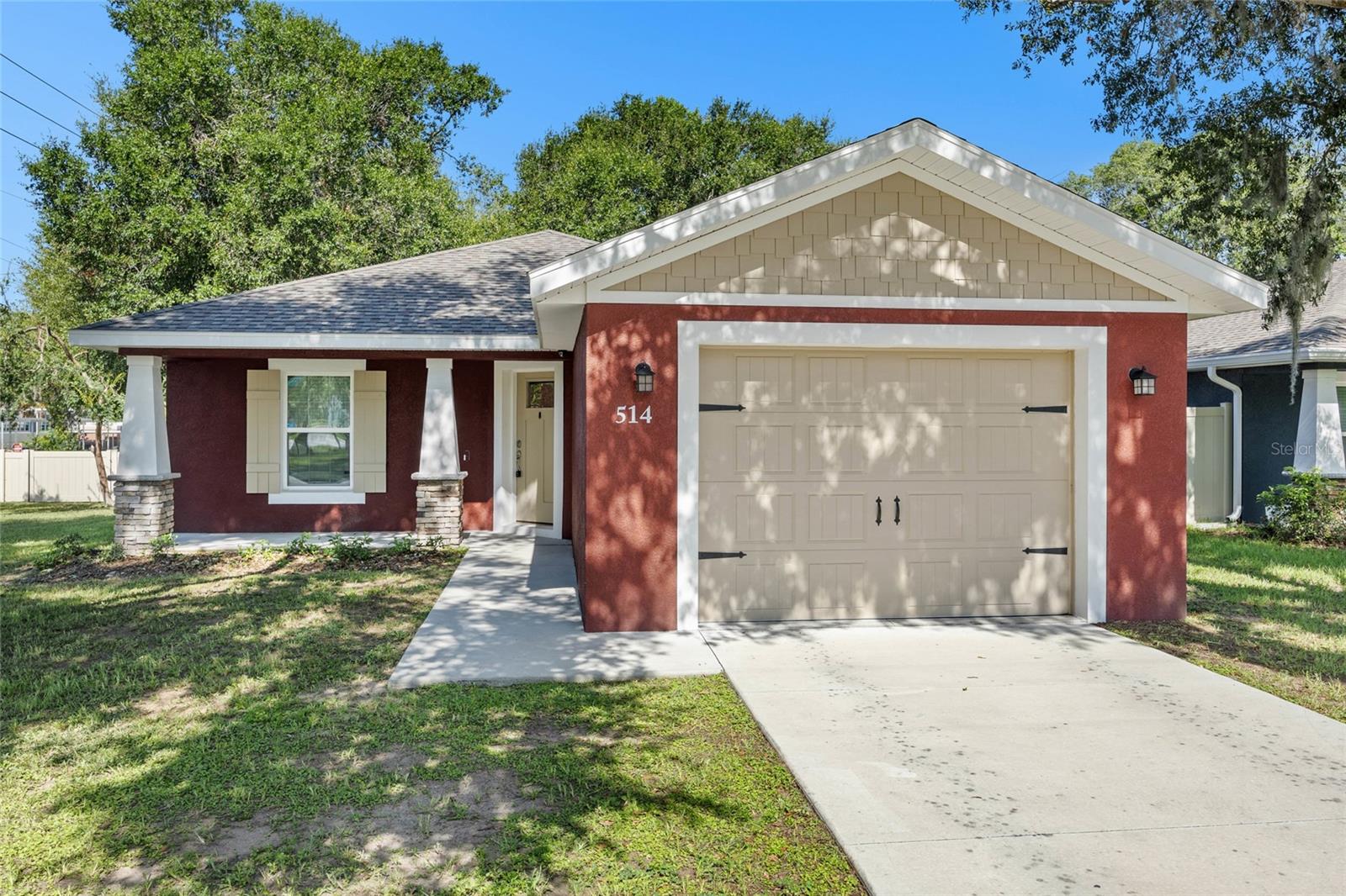 Discover this beautifully designed 3x2 KEVCO home featuring all the comforts and style of new construction. Built in 2022, this property boasts elegant tray ceilings in both the master bedroom and the spacious living room, adding a touch of luxury to the open floor plan. Conveniently located close to shopping, this home is perfect for those looking for easy access to amenities. The interior features stunning wood-look tile throughout, offering both durability and timeless style. The kitchen is a chef's dream with stainless steel appliances and sleek quartz countertops. This home combines modern finishes with practical living spaces, making it an ideal choice for comfortable and stylish living. Don’t miss out on this opportunity to own a new home with premium features!