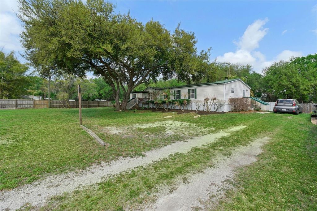 Photo of 33601 Tammy Lane, Wesley Chapel, FL 33543 (MLS # O6395625)