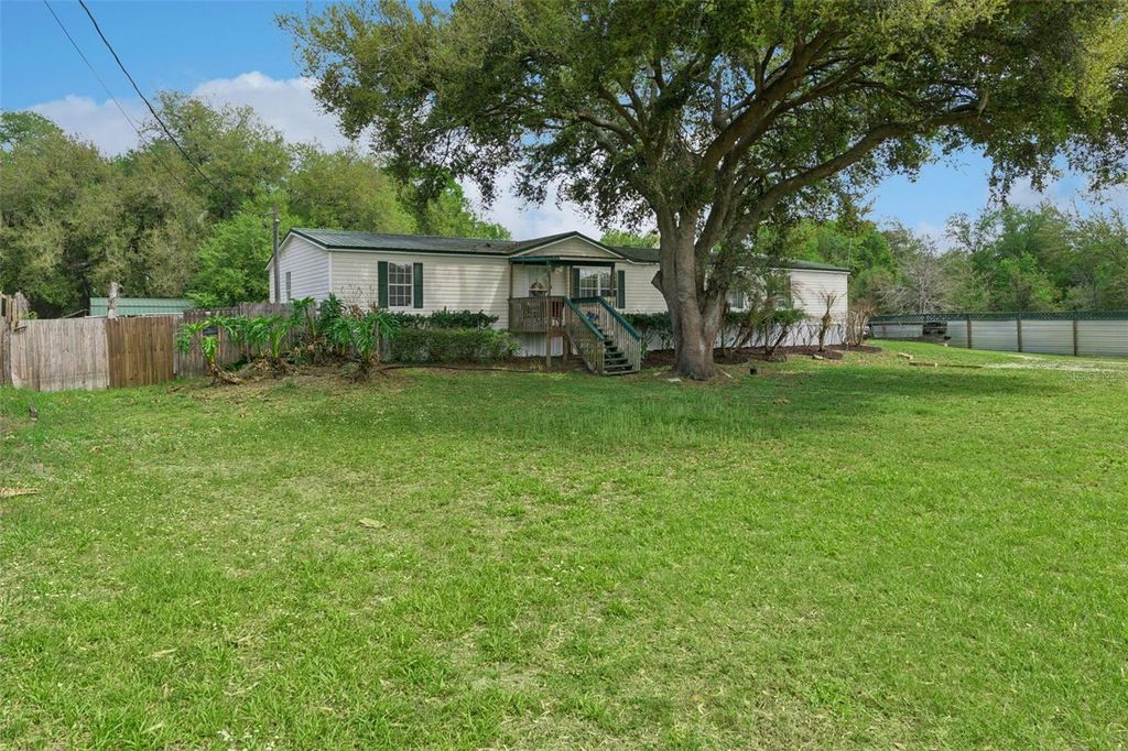 Photo of 33601 Tammy Lane, Wesley Chapel, FL 33543 (MLS # O6395625)