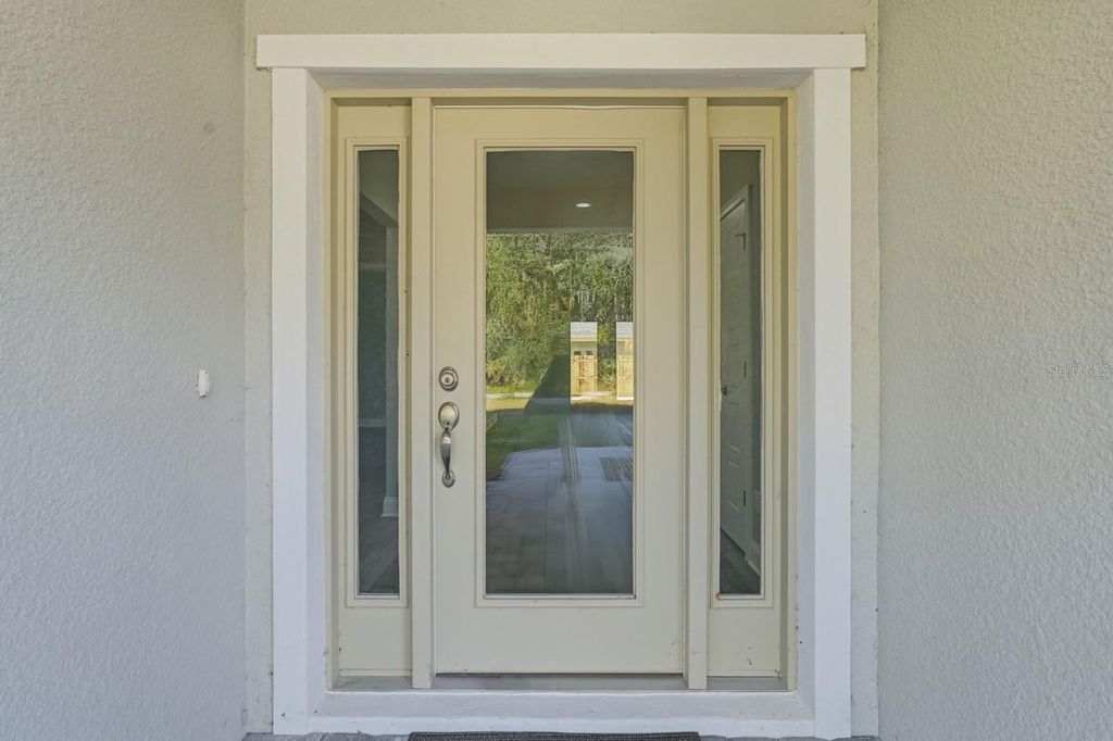 Photo of 402 Oliver Drive, New Smyrna Beach, FL 32168 (MLS # V4946834)