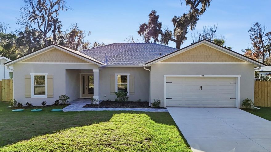 Brand new construction in New Smyrna Beach with NO HOA, a brand new fence, with room for a pool, and has an outdoor shower, this move-in ready home offers fresh finishes, quality craftsmanship, and a layout built for real life.

Built by a highly regarded local builder using stem wall construction, this home is designed for added strength and elevation, sitting approximately 2.5 feet above the crown of the road. Inside, you’ll love the split floor plan that creates the perfect balance of open living and privacy, offering 4 bedrooms, 2 bathrooms, and 1,926 sq ft of brand new living space.

The kitchen is the heart of the home and features a large island with breakfast bar seating, brand new high-end cabinets with soft-close drawers and doors, brand new appliances with a hood vent, and brand new countertops. The open-concept layout flows seamlessly into the dining and living areas, making it ideal for entertaining or everyday comfort.

The home features brand new luxury vinyl flooring throughout, giving it a clean, cohesive look from room to room. The private primary suite is tucked away on its own side of the home and includes a spacious ensuite bath with double sinks and a large walk-in shower. On the opposite side, three additional bedrooms and a full guest bath provide flexible space for guests, kids, a home office, or gym setup.

Step through the double doors to the covered lanai and enjoy a backyard that’s ready for Florida living, complete with a brand new fenced yard, an outdoor shower perfect after a beach day, and plenty of space for a pool. You’ll also appreciate the centrally located indoor laundry room and the 2-car garage (approx. 460 sq ft) featuring 13-foot ceilings, giving you extra storage space you rarely find in new construction.

For peace of mind, this home includes a one-year full warranty, plus a 10-year third-party structural warranty.

Conveniently located near Hwy 44 with quick access to I-95, and just minutes to Canal Street dining and shopping, Flagler Ave, and the beaches. Flood insurance is not required.

Schedule your private tour today and come experience brand new coastal living in one of Florida’s most loved beach towns.

Builder-provided interest rate buy-downs and special financing incentives may be available.