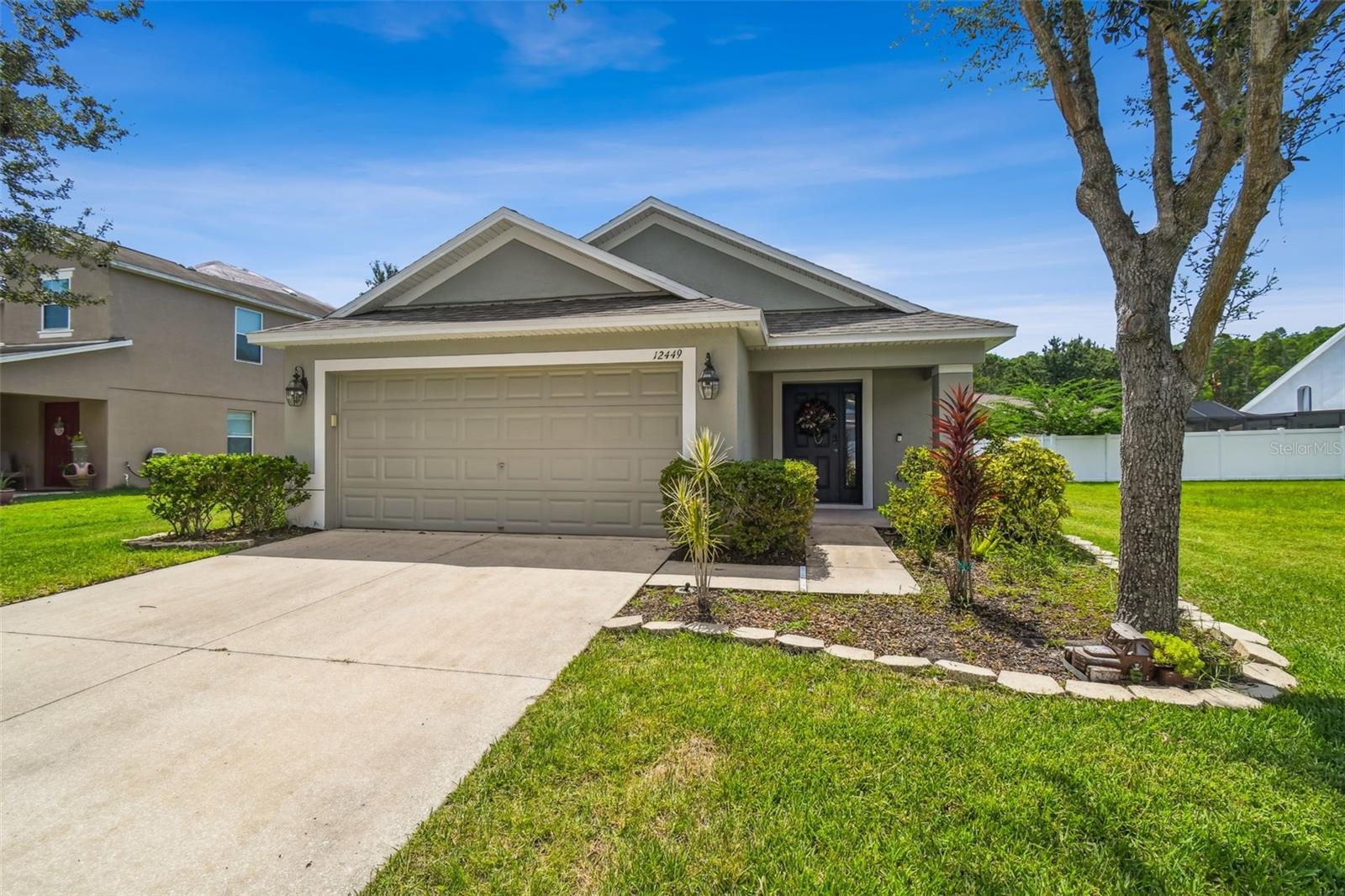Discover this move in ready home in The Verandahs! This beautifully maintained 3 bedroom, 2 bath home offers a perfect blend of comfort and style in a highly sought after community. Nestled near the end of a quiet loop with no through traffic, it boasts excellent curb appeal, a peaceful setting and a fully fenced yard. Inside, enjoy an open concept design with abundant natural light, durable epoxy terrazzo look flooring, and a spacious family room perfect for entertaining. The kitchen features a breakfast bar, generous pantry, and eat in dining area overlooking the fully fenced backyard with tranquil pond views. Additional highlights include a private primary suite with walk in closet and patio access, two guest bedrooms with brand new carpet, an inside laundry room, and a two-car garage. Roof (2025), W/H (2025), A/C (2009). Schedule a private showing today!