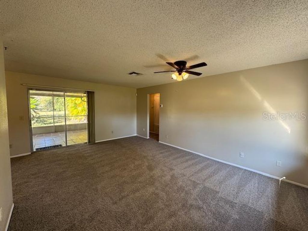 Photo of 10312 Hidden Lane, Orlando, FL 32821 (MLS # S5142489)