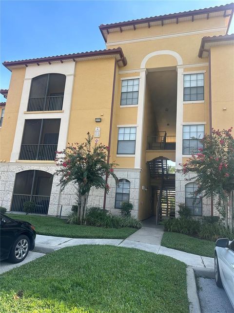 Photo of 6153 Metrowest Boulevard #205, Orlando, FL 32835 (MLS # O6324594)