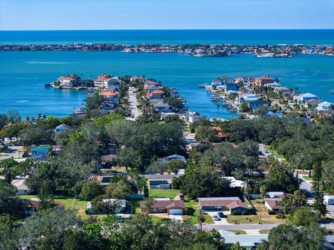 A home in BELLEAIR BLUFFS