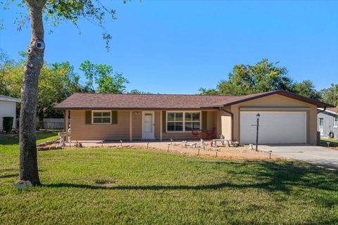 A home in BELLEAIR BLUFFS