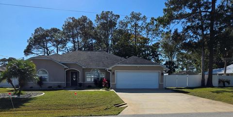 Photo of 8 Bannerwood Lane, Palm Coast, FL 32137 (MLS # FC314201)