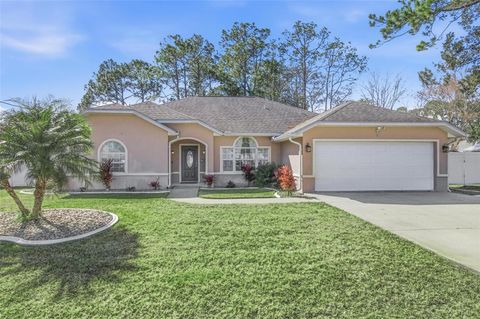 Photo of 8 Bannerwood Lane, Palm Coast, FL 32137 (MLS # FC314201)