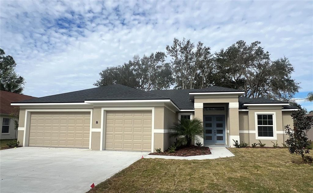 Photo of 9 Evanston Lane, Palm Coast, FL 32164 (MLS # FC313185)
