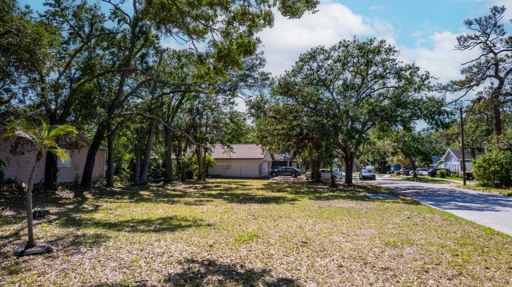 Location, Location and Equity! ! Talk about an opportunity. This spacious corner lot is nestled in the fast-growing Oak Harbor neighborhood that's less than three miles from Downtown St Petersburg and Tropicana Field. The lot offers ally access and is zoned so you can build a house with an income generating garage apartment or additional dwelling unit (ADU). This Is your chance to own property in a rapidly developing neighborhood that's ripe with new construction and development. The lot sits at higher elevation than most properties in the area and utilities are on site which reduces city impact fees for building. You can easily build your dream home and end up with hundreds of thousands of sweet equity. Why buy an older house at the top of the market when you can build a new home and gain instant equity.