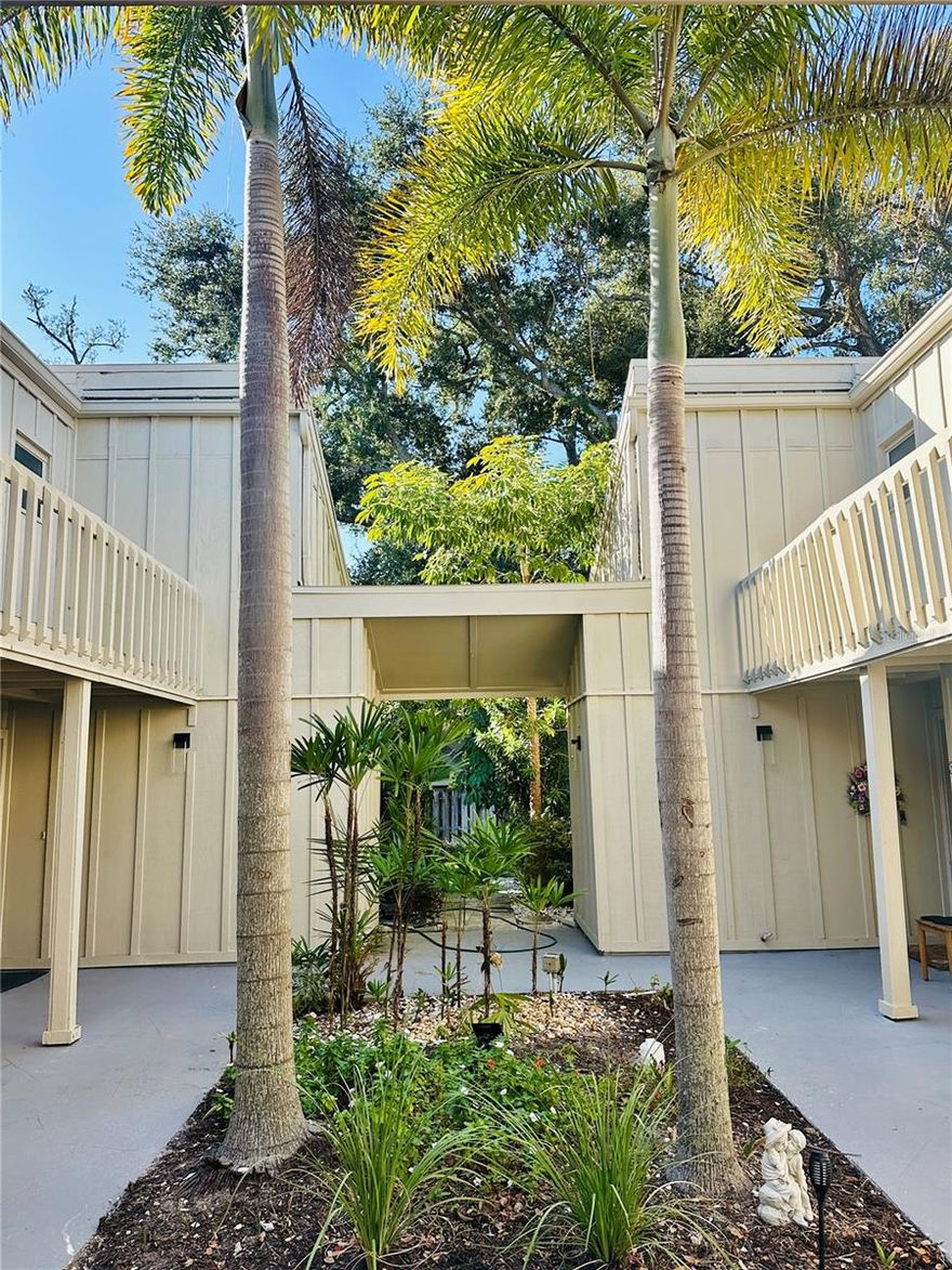 EXCEPTIONAL VALUE AND LOCATION.  This first-floor entry condo lives like a house!  It is so spacious and open with a flexible plan. The community is minutes to downtown Sarasota located in Cordova Gardens which is known for its beautifully maintained gardens, community pool and unbeatable location. This unfurnished condominium has three bedrooms and three full baths (two en suite master baths) and three outdoor patios.  READY TO MOVE IN! There are numerous closets, storage space including walk-ins, a pantry and office loft space. The condo is exceptionally clean. The community known as Cordova Gardens is minutes to downtown Sarasota as well as Southside Village and known for its beautifully maintained gardens, community pool and PRIME location for the price. The condo also includes an outdoor storage closet, assigned and guest parking, pool, grounds and building maintenance, pest control, fire/smoke detection and Association management covered by the HOA. The complex is 5 minutes from downtown Sarasota and 15 minutes from Lido and Siesta Key beaches.
