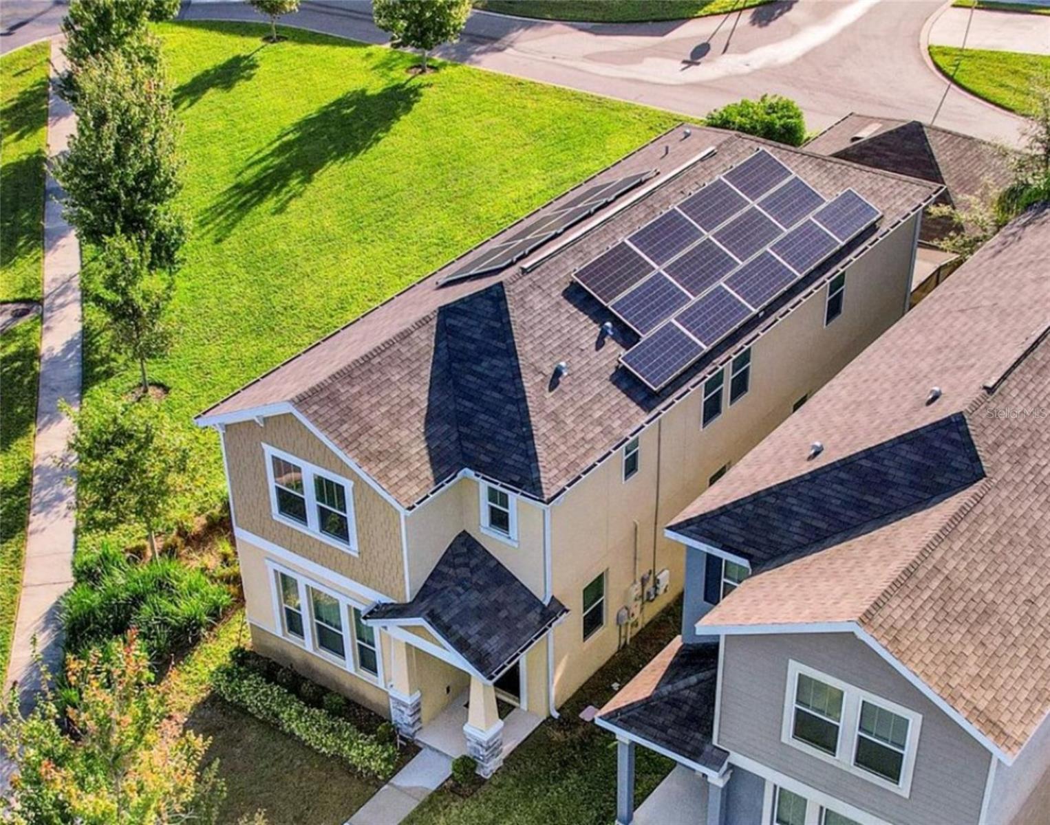 WINTER GARDEN STOREY GROVE, SOLAR ENERGY, DOUBLE MASTER SUITES – DISNEY FIREWORK VIEW – The walkway between the main house and rear garage is FULLY SCREENED. Only minutes walking distance to the Elementary school or Middle school. 
Beautiful newer 2-story solar-powered home located on a desirable corner lot in the popular community near Disney. Two master suites, one downstairs and one upstairs, each feature a walk-in closet.  The open-concept main floor includes a bright kitchen, dining area, and living room. Upstairs offers a huge loft plus two additional bedrooms and a full bath. The screened backyard with a paver patio is perfect for relaxing or entertaining. Whole-house water softener system installed.  Community amenities include a pool, dog park, playground, and fitness center. Make this beautiful home the place where you and your loved ones create lasting memories.