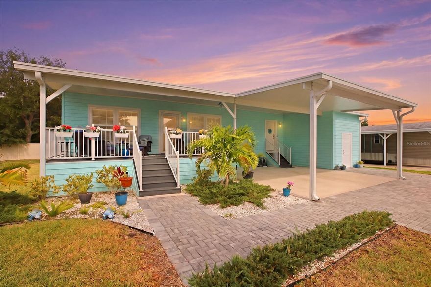 Welcome to paradise in the sought-after 55+ waterfront community of Harbor View On The Bay! Built in 2022, this beautifully upgraded 3-bedroom, 2-bath manufactured home offers the perfect blend of modern coastal style, quality construction, and low-maintenance Florida living just moments from Charlotte Harbor. Featuring over 1,600 square feet of living space, this home was thoughtfully designed with an open-concept split-bedroom floor plan that lives large and feels bright, airy, and inviting from the moment you walk in. The chef-inspired kitchen is truly the heart of the home, complete with granite countertops, oversized custom island, 42” cabinetry, full glass backsplash, convection wall oven and microwave, cooktop with sleek European range hood, recessed lighting, and abundant prep and storage space. The spacious living and dining areas flow seamlessly for easy entertaining, while the high-impact sliding glass doors lead to a private outdoor space perfect for enjoying peaceful mornings or relaxing after a day on the water. The primary suite offers a spa-like feel with a beautifully tiled shower and comfort-height vanities, while the guest bedrooms provide flexibility for visitors, hobbies, or a home office. Additional upgrades include vinyl plank flooring throughout, impact-resistant windows, Hardie cement-composite siding, Galvalume metal roof, upgraded insulation, 9-foot ceilings with crown molding, 2x6 exterior walls, and Wind Zone 3 construction for added durability and peace of mind.  Located in an active and pet-friendly community known for its coastal charm and resort-style atmosphere, residents enjoy amenities including a fishing pier, clubhouse, community activities, shuffleboard, and stunning waterfront surroundings near dining, shopping, boating, beaches, and historic downtown Punta Gorda. Whether you’re searching for your seasonal escape or full-time Florida retreat, this move-in ready home delivers the lifestyle buyers are actively searching for in Southwest Florida.