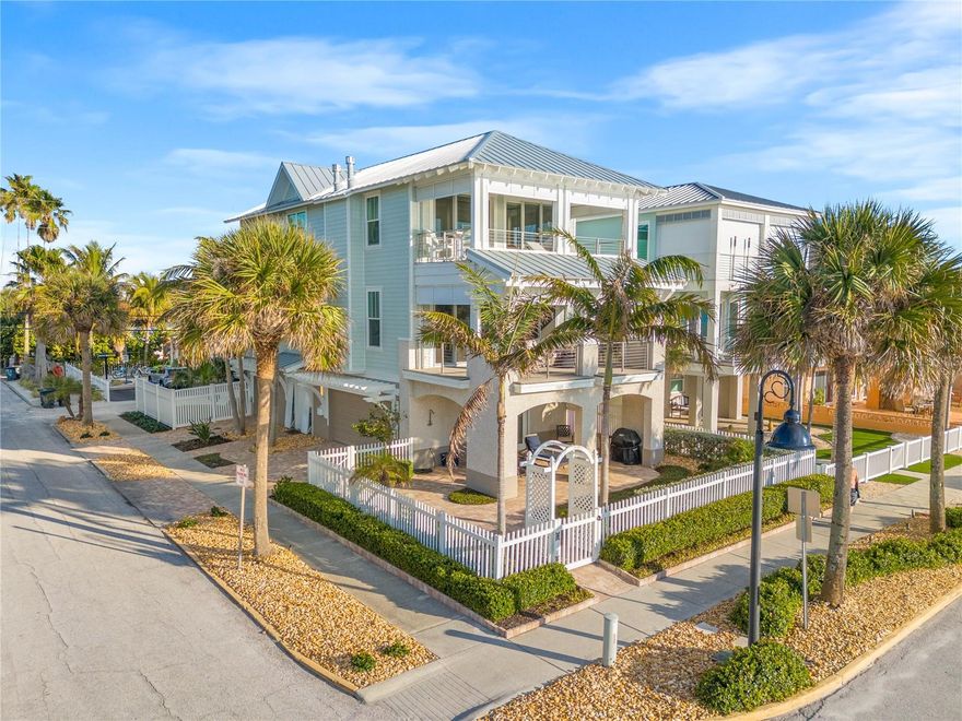 Completely remodeled in 2018, this home had an extensive renovation down to its studs. The home stands three stories tall with endless views of the Gulf of Mexico to the front and Pass A Grille Channel to its back. The main living level is on the second floor allowing for ample natural light and beach views. The kitchen has stunning Quartzite countertops, top of the line appliances, and a 105 bottle Sub-Zero wine fridge. The kitchen has a reverse osmosis system for purified drinking water and an insta hot water spout at the kitchen sink. The kitchen overlooks a spacious living room with a fireplace and is adjacent to the dining area. The dining area has beautiful views through two sets of sliders that lead you out to the oversized balcony. The balcony is open and breezy and allows for a comfortable resting spot shielded from the hot Florida sun. Back inside on the second level, is a large sized bedroom perfect for guests with an en-suite bath that also has access to the main living space. A laundry room and a full sized pantry are also located down this corridor. If you prefer not to take the stairs to the third level, you can comfortably take the home elevator there. At the top of the landing on the third level, there is a large window with Gulf views and an en-suite bedroom towards the back of the home. The bedroom has views of the Pass A Grille Channel and could pose as a quiet home office space. Privately located in the front of the home is the primary suite. The suite is large in size and has room for a seating area. The room houses the second fireplace in the home and has double walk-in closets with built-ins. The brightly lit primary bath has a free standing soaking tub, tiled glass enclosed shower and the same stunning Quartzite countertops as the kitchen. The primary suite has wall to wall double sliders allowing for breath taking, unobstructed views of the Gulf of Mexico. These sliders lead out to a private balcony solely accessible from the primary suite. There is plenty of space for lounge furniture to watch the sunset and truly embrace beachfront living. The entire first floor of the home is a three car garage with plenty of space for storage. The garage is equipped with a Tesla Charger and has access through French doors to the fenced in paver courtyard. The courtyard is the perfect spot to grill out and socialize after a long day at the beach. The home is also equipped with hurricane high impact windows, hurricane shutters, and also electric roll down hurricane shutters for both of the balconies. Every window has hidden electric shades that are remote operable and the home has 5 driveway parking spaces which are key to beachfront living. The home is located just two blocks from Pass A Grille's coveted downtown area full of local boutiques, restaurants, rooftops, and a beachfront restaurant. There is a dog beach as well as public shuffle board, tennis, and pickleball courts. You are just a short golf cart ride away from the iconic Don Cesar, a luxury hotel with a state of the art spa and delicious restaurants. The Pass A Grille Marina is a short ride away as well to store your boat and water toys. This area of the island is special as it’s narrowness allows for both intracoastal and Gulf water play all within a few blocks spread. This allows for a relaxing kayak paddle in the intracoastal in the morning and a sunset beach walk in the evening. Pass A Grille is truly the location to live like a local and play like a tourist.