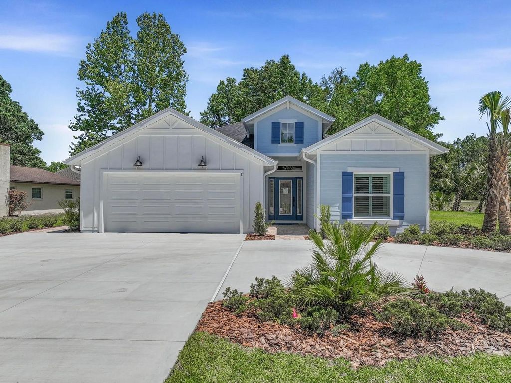 Photo of 31 Cimmaron Drive, Palm Coast, FL 32137 (MLS # FC319807)