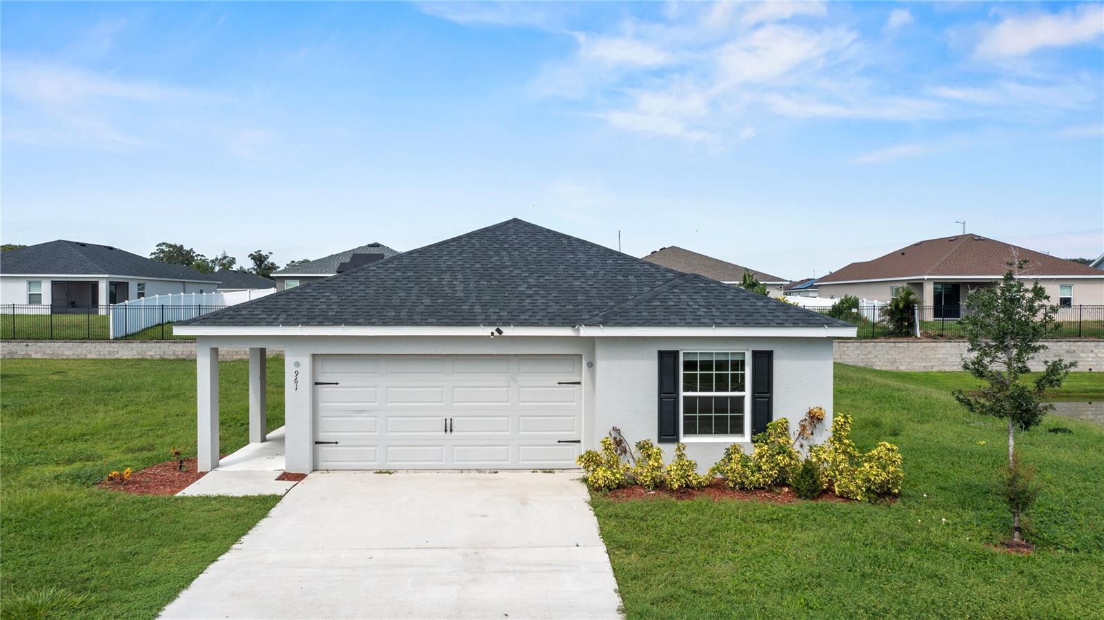 Short Sale. Discover this stunning 4-bedroom, 2-bathroom Highland Homes Peyton model in the desirable Lakes 2 community! This lovely home features an open-concept layout with high ceilings, granite countertops, stainless steel appliances, and a freshly painted interior. The spacious primary suite includes a walk-in closet, and the home sits on the largest lot in the neighborhood (70 ft wide). Additional highlights include a 2-car garage, low HOA, and a quiet community setting with a nature preserve. Conveniently located between Lake Haines and Lake Rochelle and just minutes from I-4 for easy access to Orlando, Tampa, shopping, and dining.