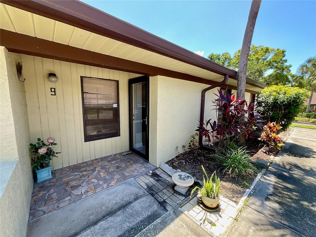 Photo of 1311 Powderpuff Drive #1009, Dunedin, FL 34698 (MLS # TB8418729)