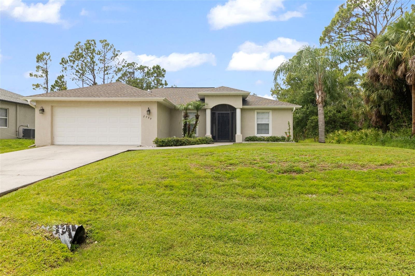 This chic and modern annual rental offers a prime location for commuters, making it an ideal choice for your next home. You are welcomed with a well manicured yard and versatile screened porch. Your Amazon packages will be safe and sound. The open floor plan is designed to promote family togetherness, with a breakfast bar perfect for after-school conversations as kids enjoy snacks. The dedicated dining area is well-suited for Sunday dinners, and Friday nights can be spent enjoying movies together on the couch. The kitchen enhances functionality with ample cabinet and pantry space. For privacy, the primary bedroom is strategically positioned away from the guest bedrooms and offers a large walk in closet, dual vanities, a soaking tub and a spacious walk-in shower for added convenience. Additional storage available in the backyard shed. we can never have enough storage! Located in North Port, one of Florida’s fastest-growing cities, the home is just minutes from the interstate, offering easy exploration of the local area. Residents can enjoy access to parks, golf courses, and a variety of local amenities. For those who love the beach, a short 30-minute drive will take you to the Gulf beaches along Manasota Key or Nokomis Beach, known for their beautiful white sand and clear waters. These beaches, ideal for shelling and shark tooth hunting, are pleasantly uncrowded. Golf enthusiasts will find numerous courses nearby, catering to both beginners and experienced players alike. North Port is a family centric community.