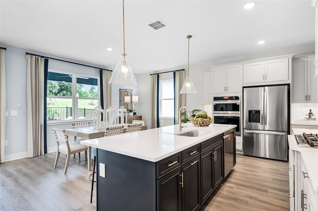 Photo of 714 Emerald Grove Drive, Apopka, FL 32703 (MLS # W7887281)