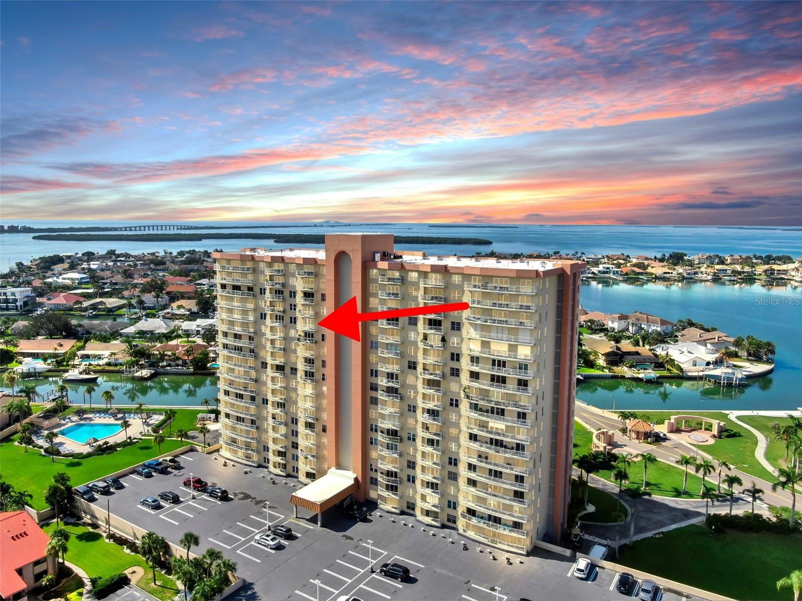 I'm honored to bring to you this north-side 14th-floor single-bedroom condominium in the well-known *Building Six* at Point Brittany Condominiums on the Bayway Isles in St. Petersburg Florida! Unit 1405 faces north which means it has a birds view of downtown Gulfport and downtown St. Petersburg. Brand New PGT hurricane impact window and sliders (2025). Brand New Carpet (2025). Brand New HVAC (2025). Brand new Roof (2025). Looking for a crash pad when you visit St. Pete that won't require much maintenance? and you only need one bedroom? Then, this is the place for you! The master bedroom is a great size. There is a walk-in closet across a natural space for a desk. There is also an en-suite bath- accessible too from the main living space. There are closets that line the hall between the bath and the kitchen. There's also a storage closet at the end of the hall, where you will find the laundry room. As far as amenities, Point Brittany does not disappoint. You have four pools; the main clubhouse pool has lap lanes. Hot tub, Saunas in the bathrooms by the main pool. There is a fitness center inside the clubhouse with newer equipment. Pickleball is big here! Tennis and shuffleboard too. Social clubs galore! My favorite is the beautiful walking path along the concrete seawall. The location is truly unbeatable! Who can forget the beaches are just a bike ride or uber away! You're welcome to reach out to schedule a virtual or in person showing now before its gone!