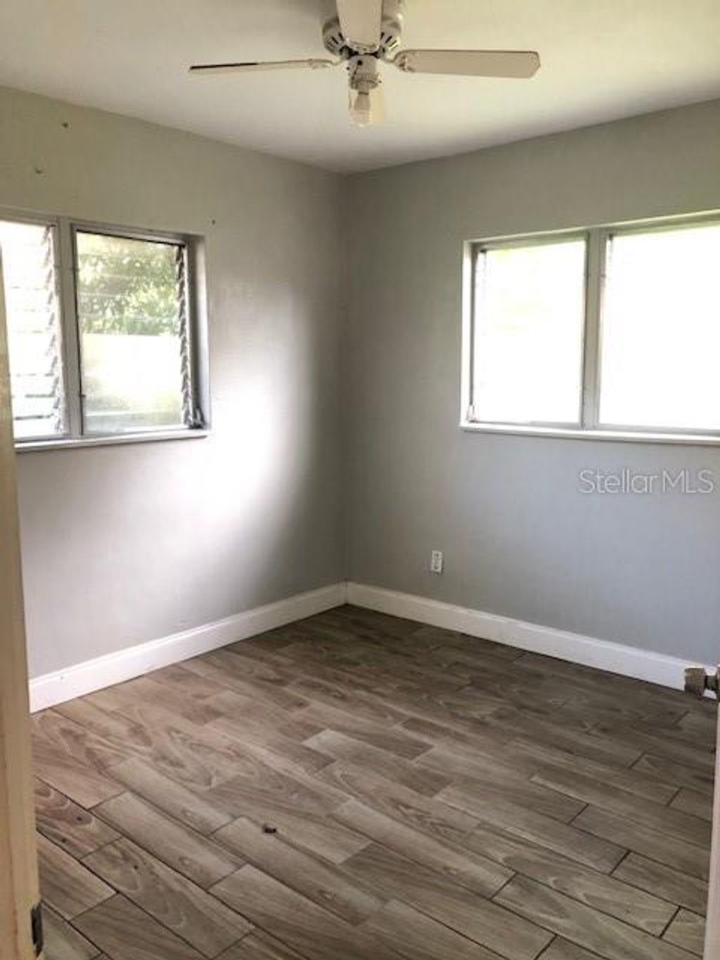 Photo of 1955 N Old Coachman Road, Clearwater, FL 33763 (MLS # TB8500112)