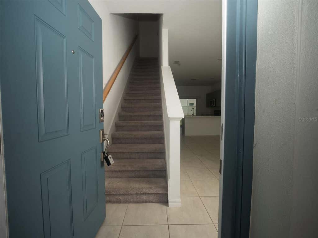 Photo of 3208 Skyline Loop, Poinciana, FL 34758 (MLS # O6434334)