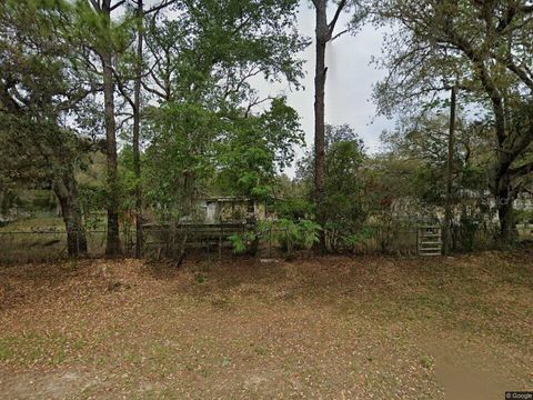 Photo of 112 Thompson Avenue, Interlachen, FL 32148 (MLS # S5145473)
