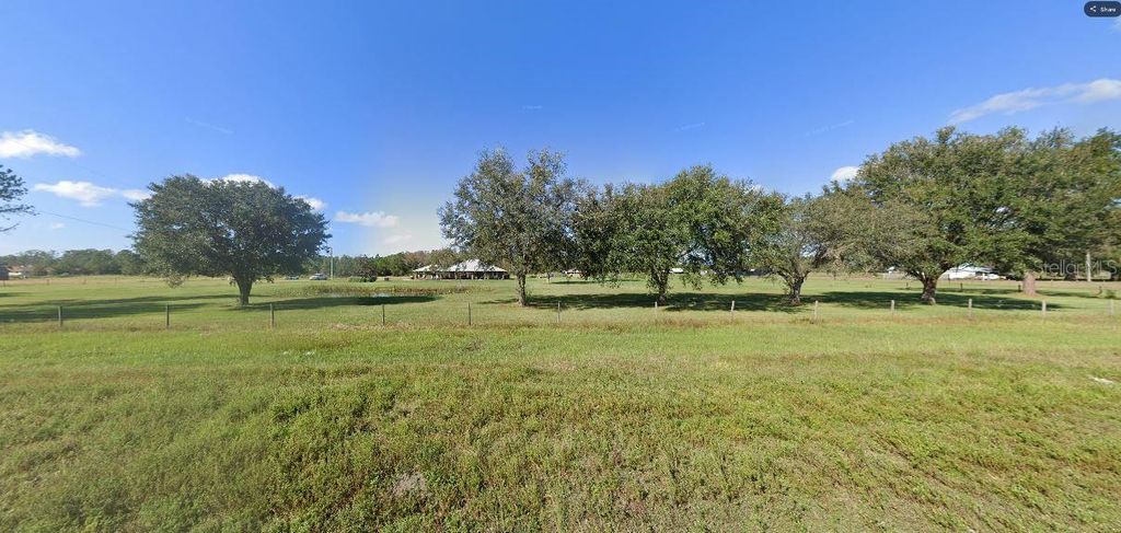 Photo of Old Grade Rd, Polk City, FL 33868 (MLS # O6266205)